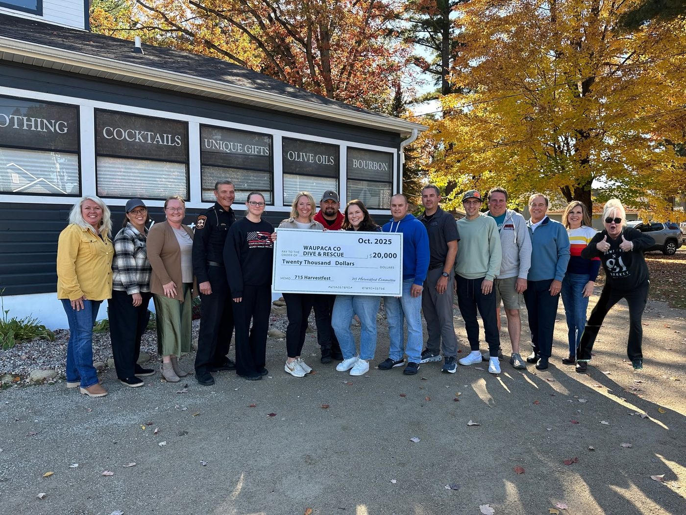 715 Harvest Fest organizers presenting a $20,000 check to Waupaca County Dive & Rescue