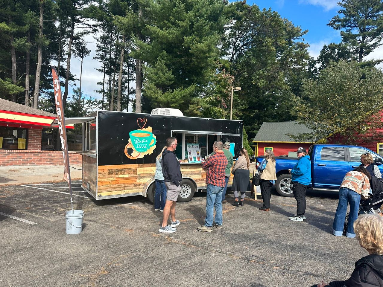 The Rustic Java coffee food truck serving festival-goers