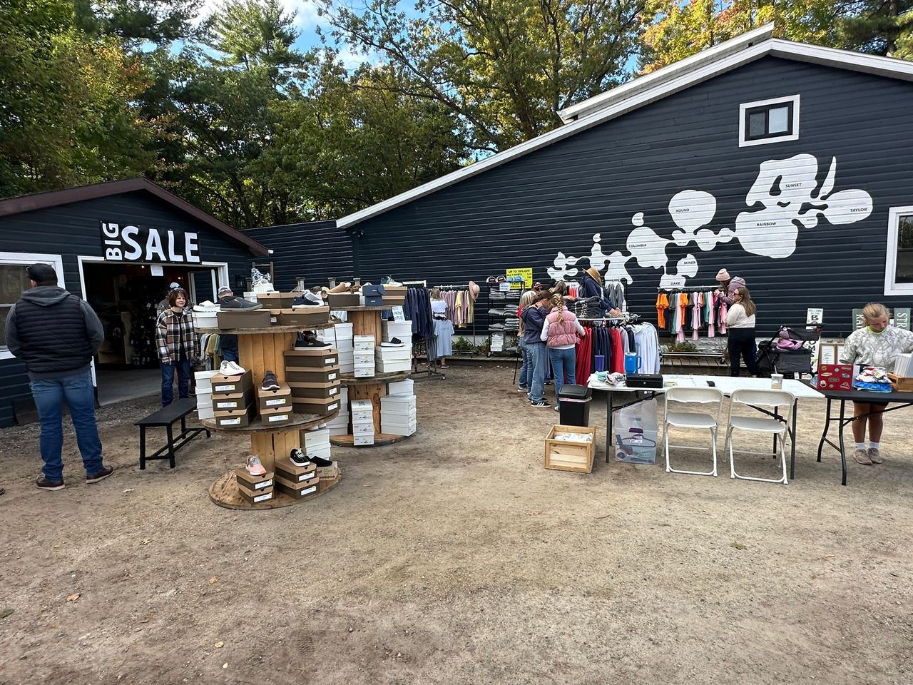 Local shop decorated for fall with a sale sign