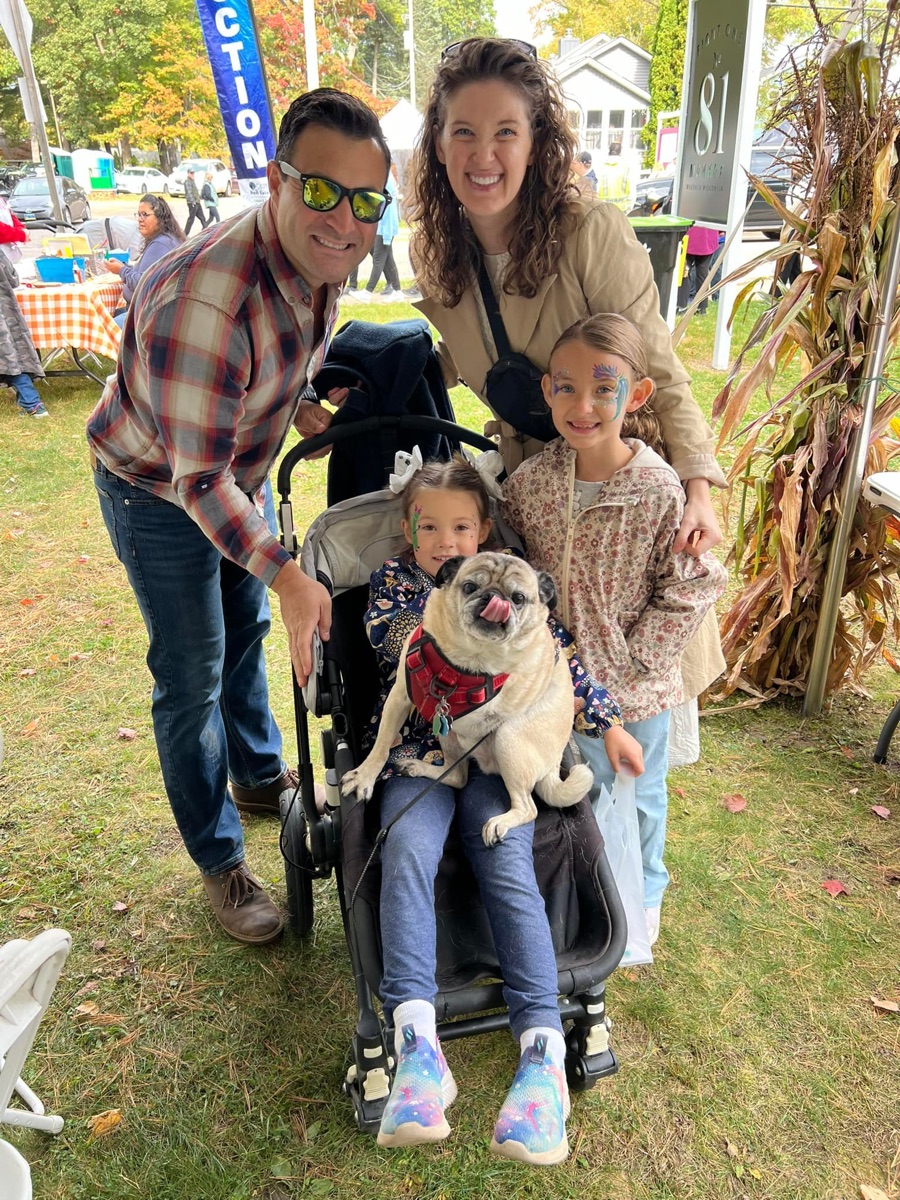 A family with two children and their dog at 715 Harvest Fest